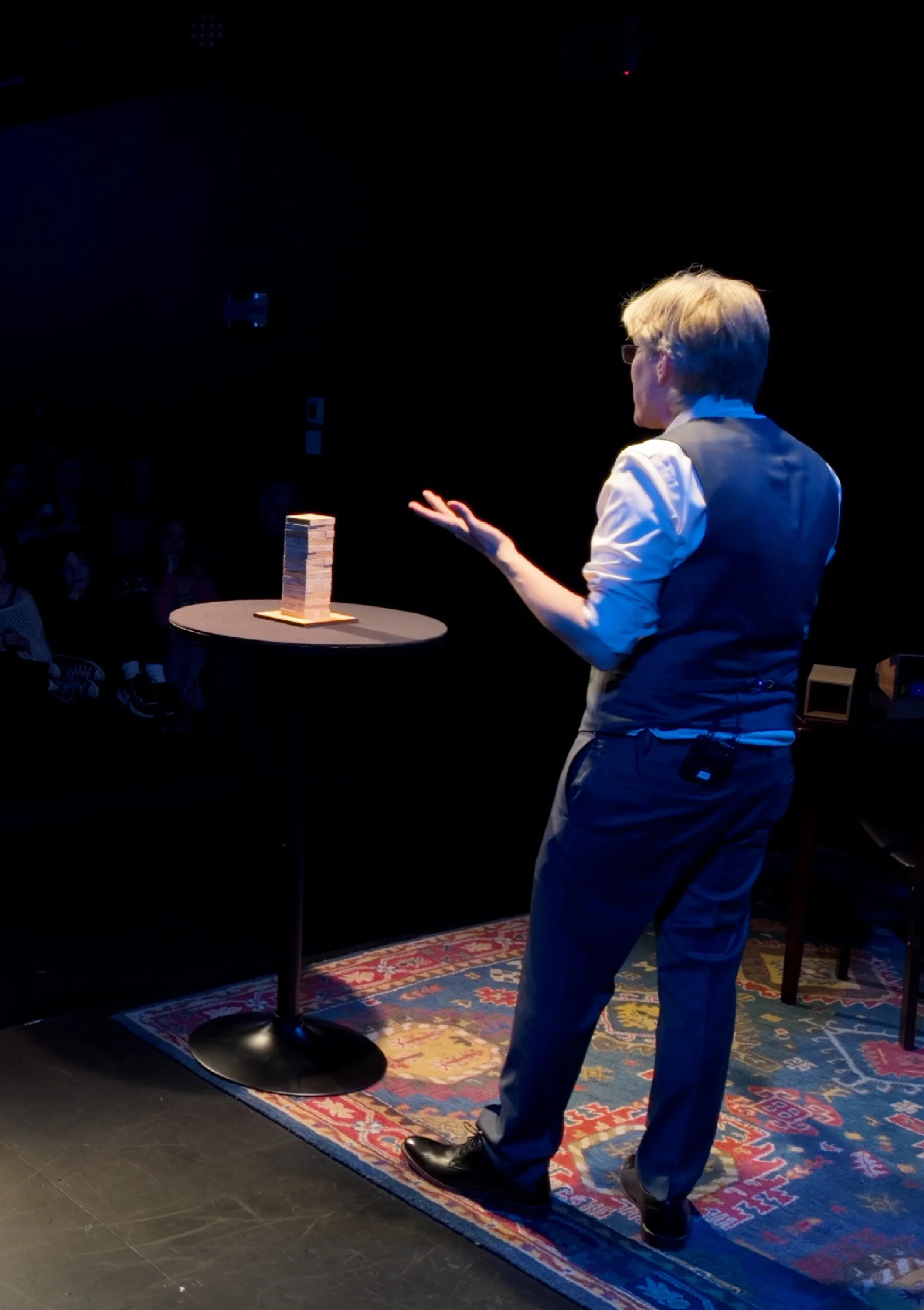 Chris Canfield performing The Games We Play on stage